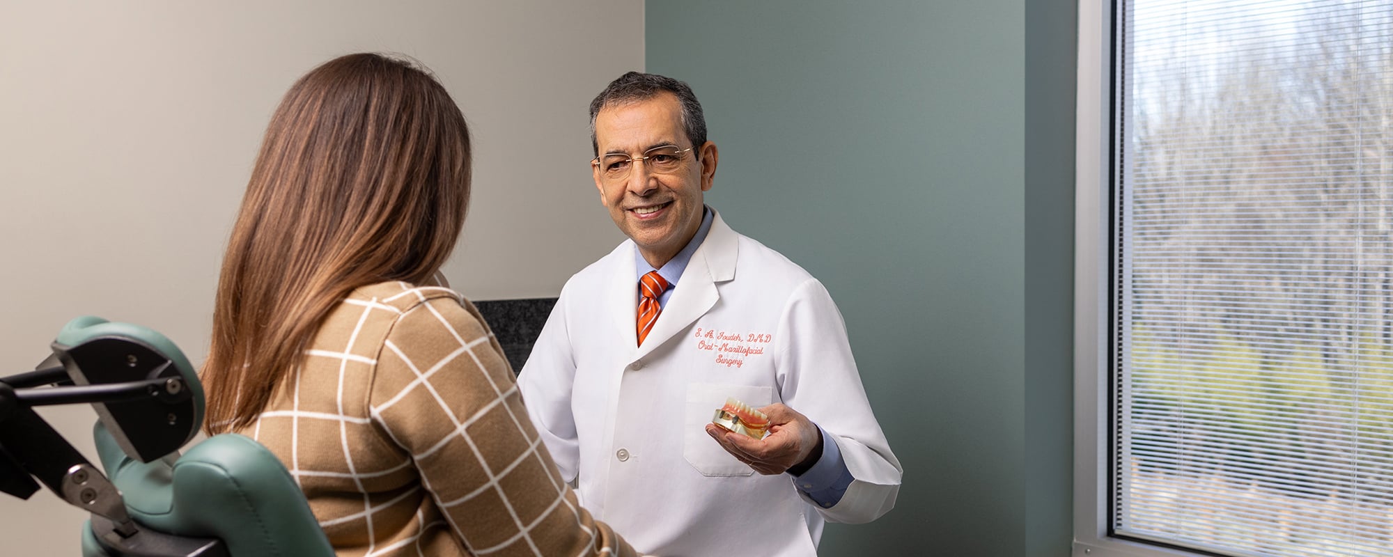 Doctor preparing patient for treatment